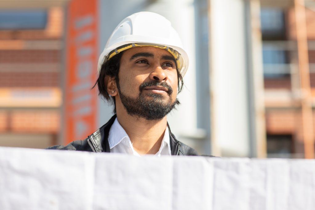 engineer holding paper